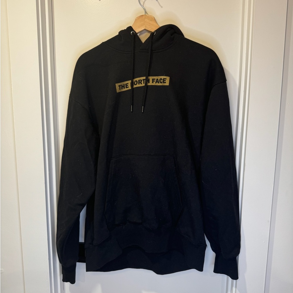 The North Face Black Hoodie with Gold Logo
